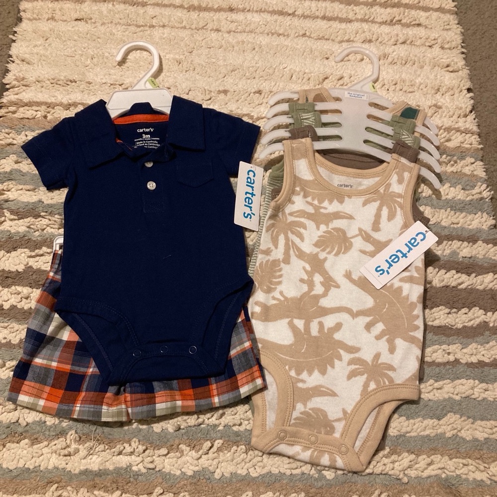 5 piece Carter set. Cut designs. And boys lil short set.